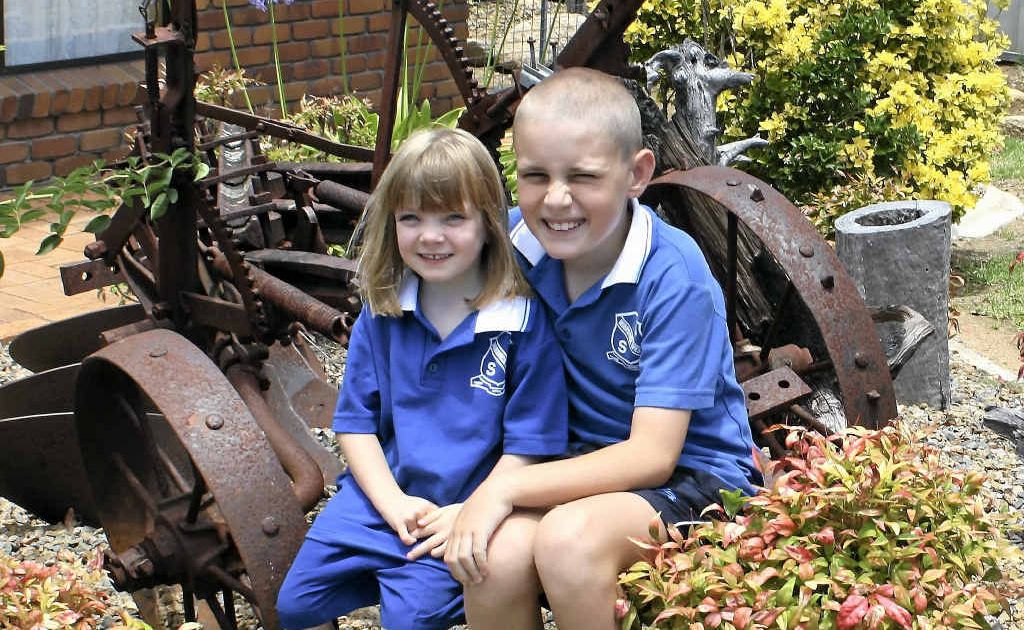 Four-year-old Chloe Koch is ready to tackle big school, with her older brother, Ben. Four-year-old Chloe Koch is ready to tackle big school, with her older brother, Ben.